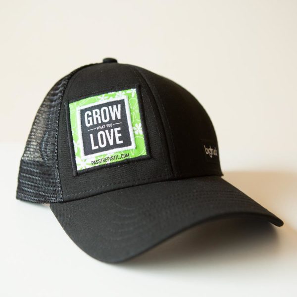 a black hat with "grow what you love" embroidered on the face